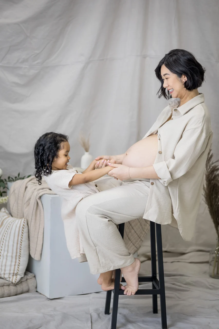 Edmonton studio maternity session of mom & big sister by Paper Bunny Studios