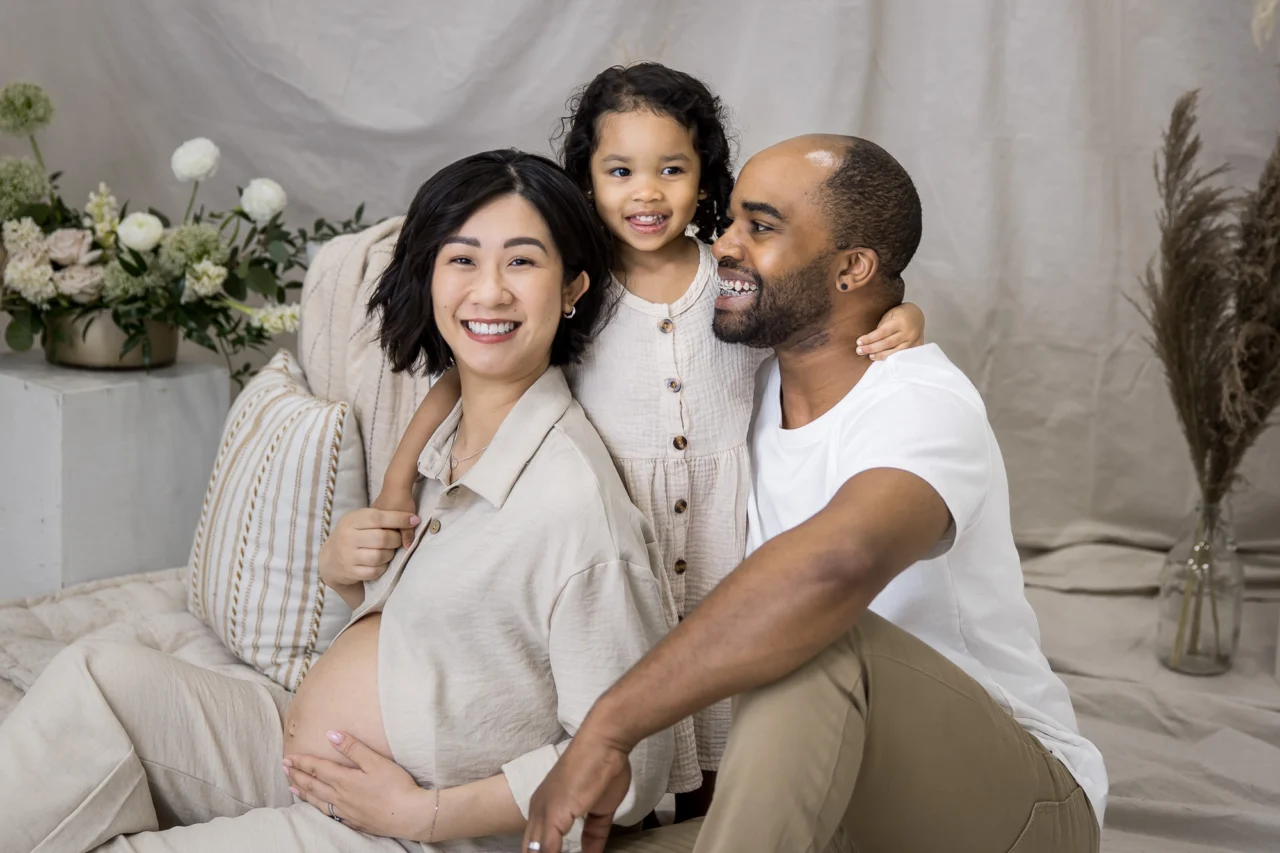 Edmonton studio maternity session of mom,dad & big sister by Paper Bunny Studios