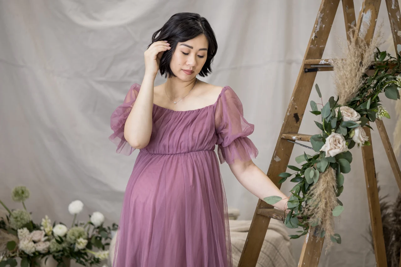 Classic maternity portrait of mom in flowy dress by Edmonton Family photographer Paper Bunny Studios