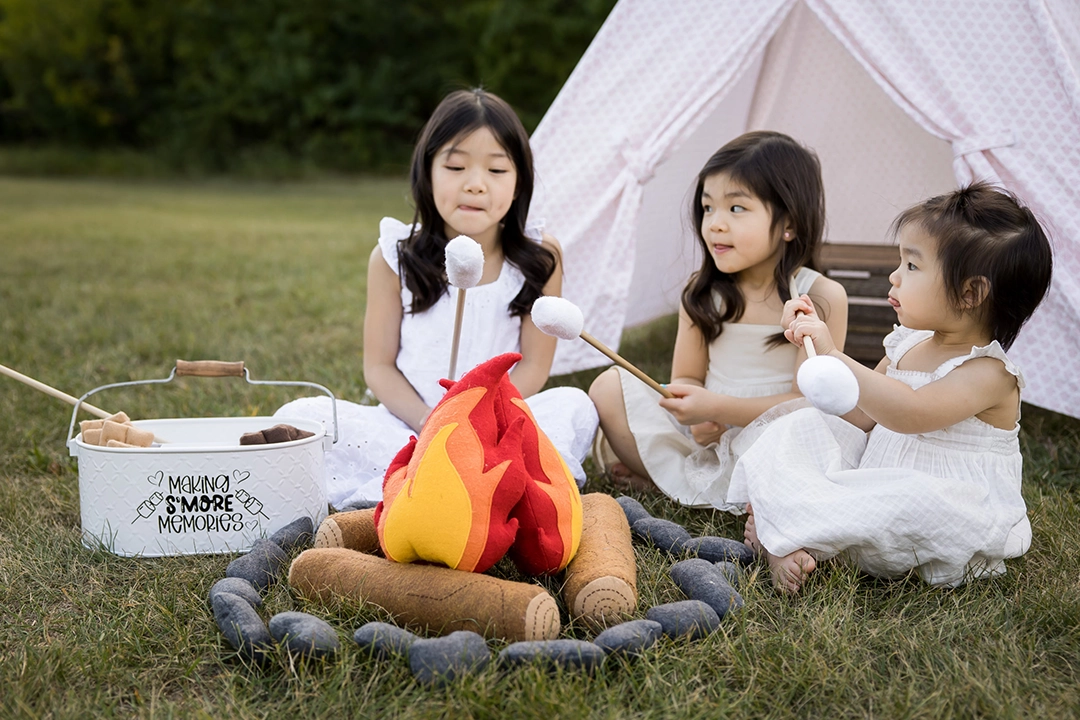 Outdoor family portraits with campfire props by Paper Bunny Studios