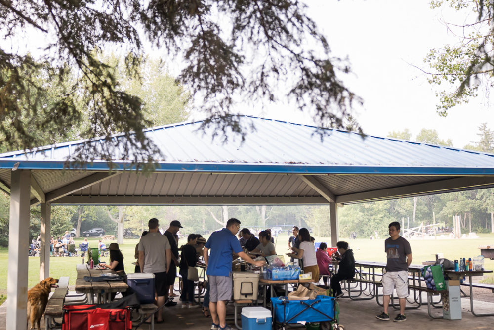 Documentary family reunion photography of the BBQ area by Paper Bunny Studios Edmonton