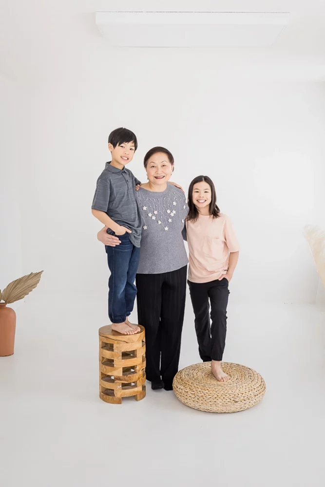 Edmonton extended family studio photos by Family Photographer Paper Bunny Studios portrait of grandma and 2 of the grandkids