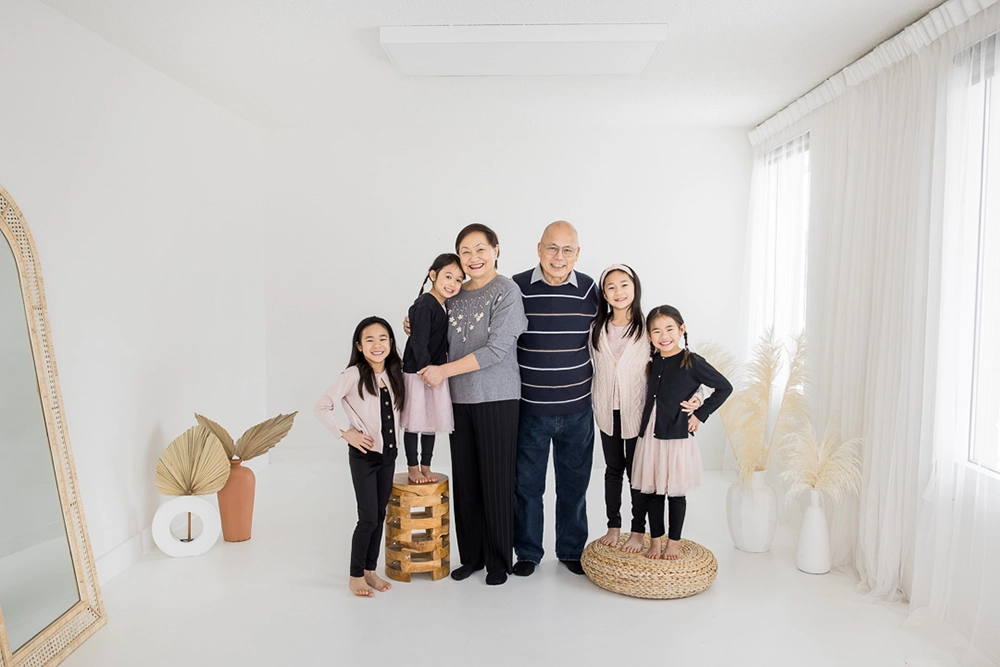 Edmonton extended family studio photos by Family Photographer Paper Bunny Studios of grandparents and granddaughters