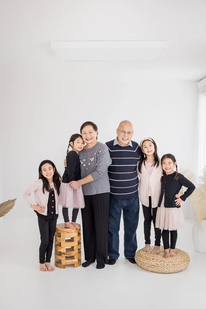 Edmonton extended family studio photos by Family Photographer Paper Bunny Studios portrait photo of grandparents and granddaughters