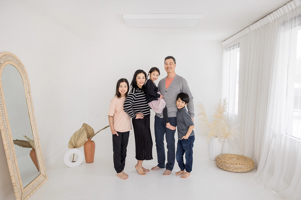 Portrait of mom, dad and kids by Edmonton Family Photographer Paper Bunny Studios