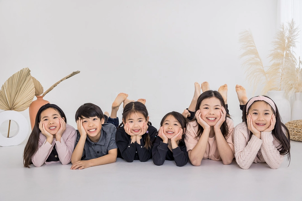 Cousins photo - all smiles  by Edmonton Family Photographer Paper Bunny Studios