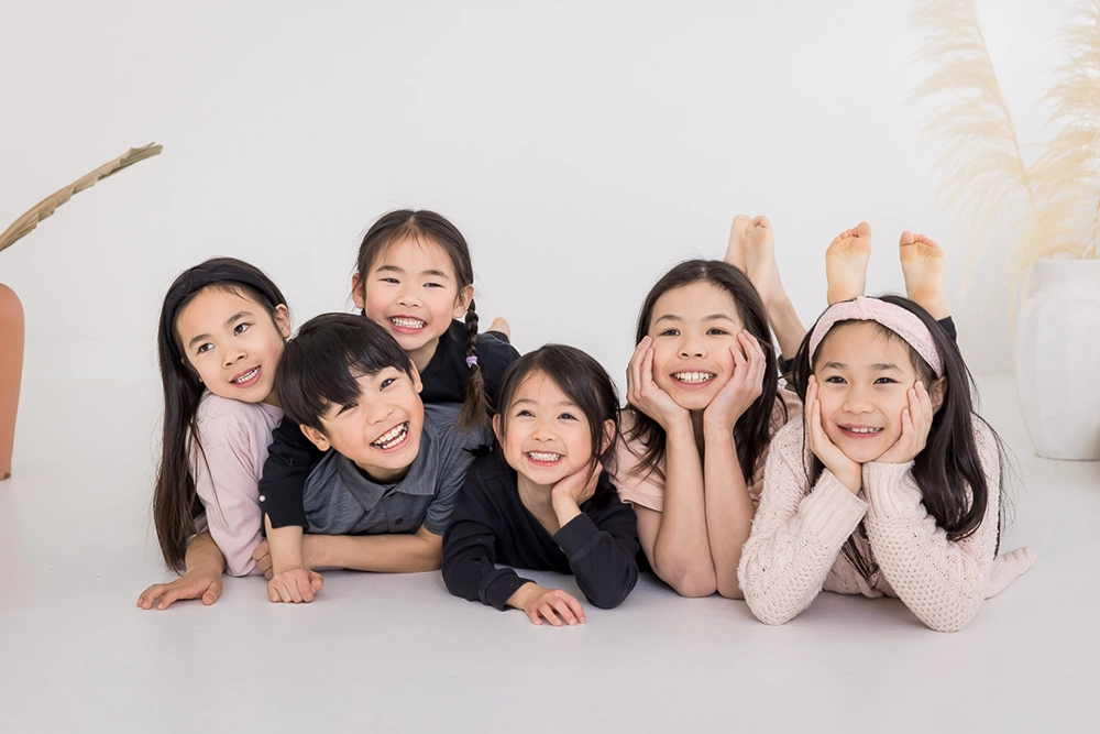 Sweet cousins photo  by Edmonton Family Photographer Paper Bunny Studios