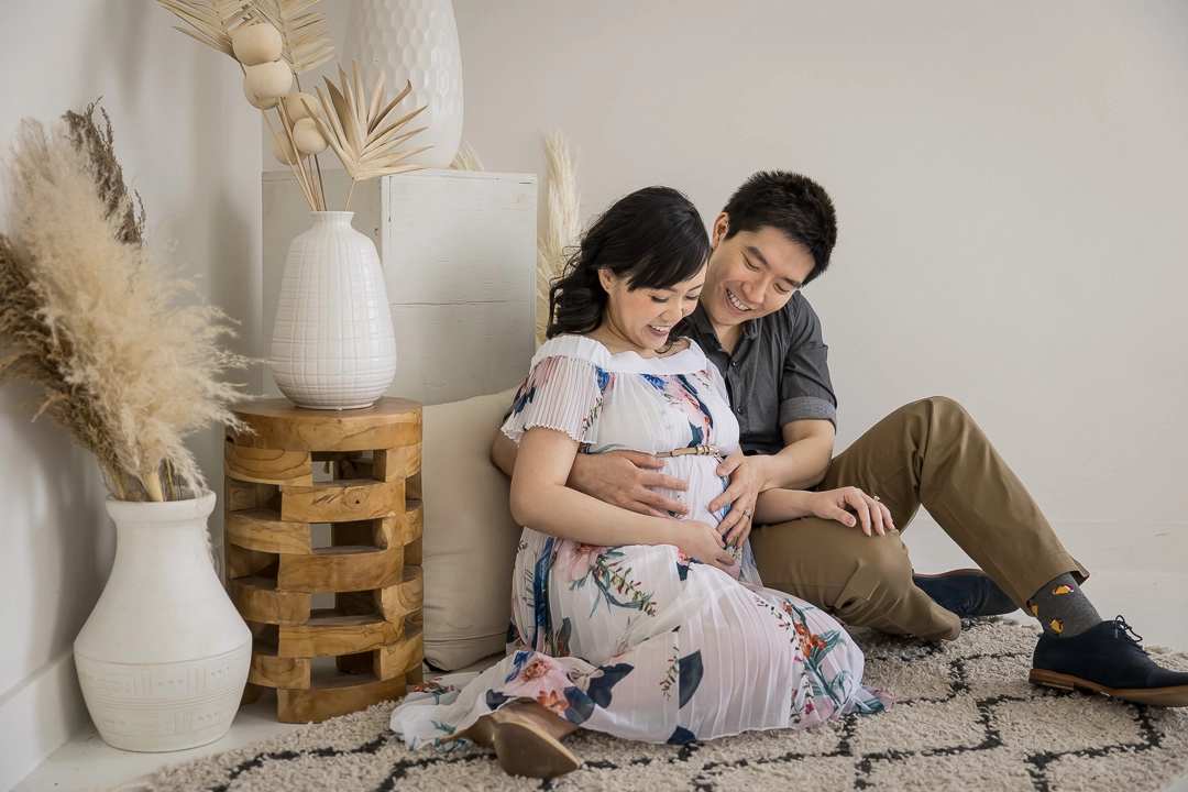 Maternity photos mom & dad cradling bump by Paper Bunny Studios Edmonton family photographer