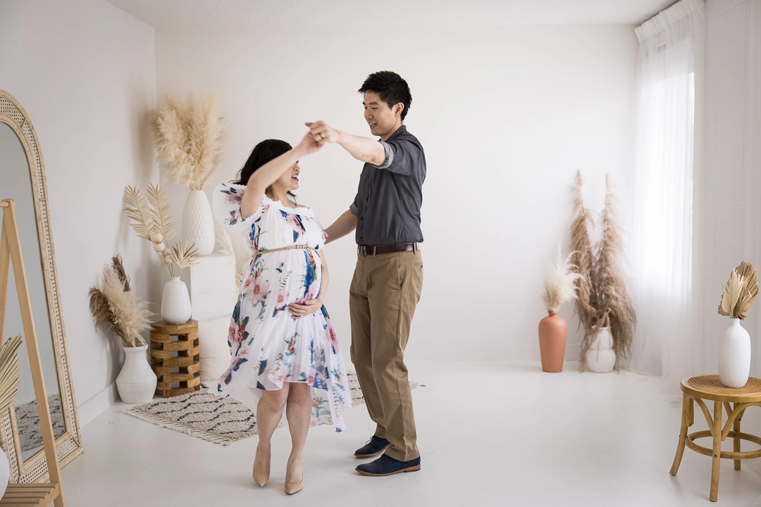 Maternity photos - mom & dad dancing by Paper Bunny Studios Edmonton family photographer