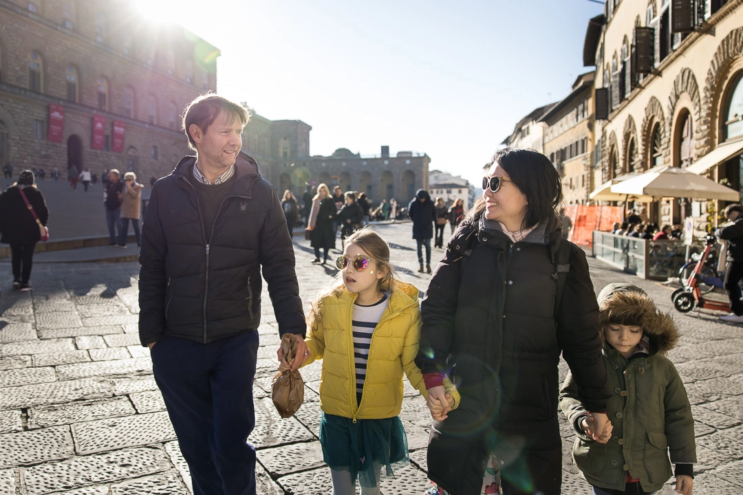 Family walking in Florence by Edmonton family photographer Paper Bunny Studios