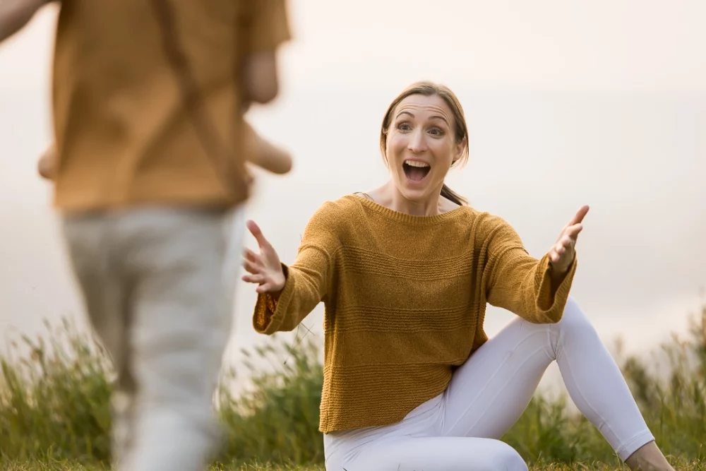 outdoor yoga family photo session by Paper Bunny Studios - Mom greeting son